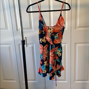 Monteau floral romper